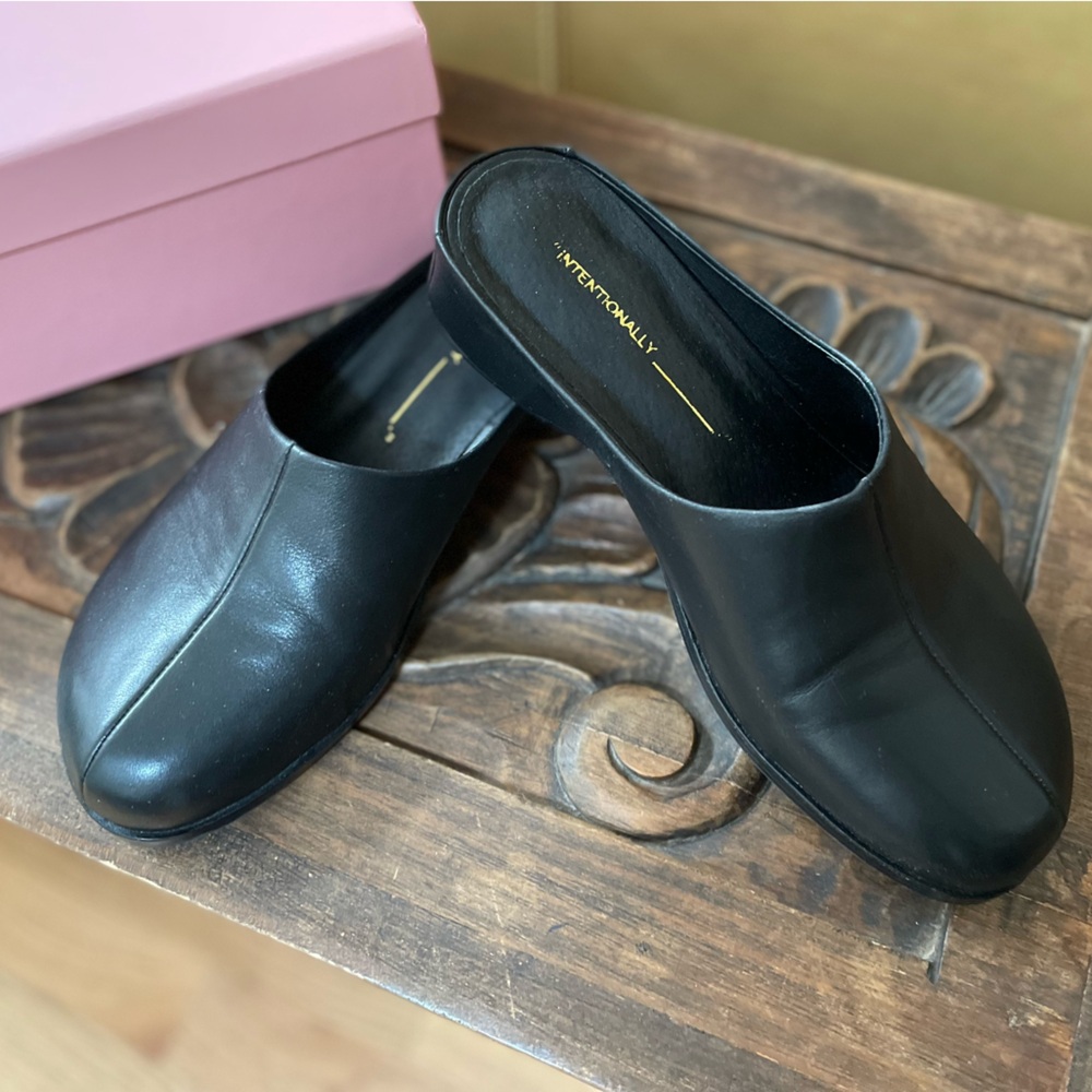 Intentionally blank Shift mules size 8.